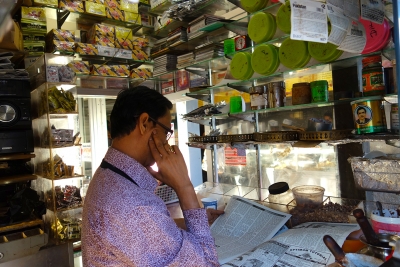 Paan wallah in his shop