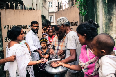 The Hussains’ doorman distributing meat