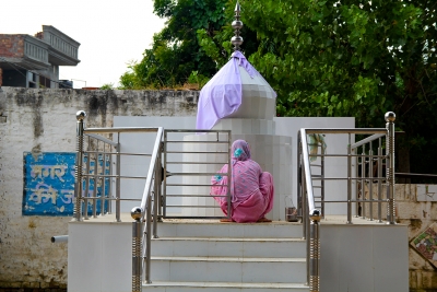 Praying at the mandir