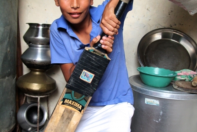 Cute cricket kid