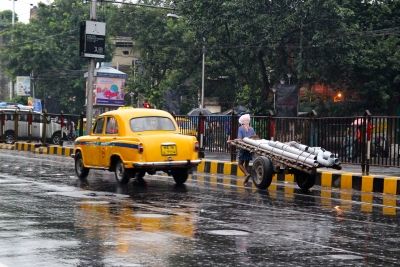 Kolkata taxi and cart puller