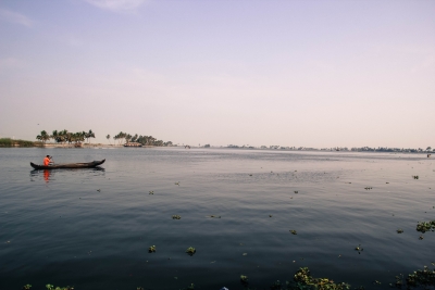 A fisherman heads out to Vembanad Lake, Kerala.